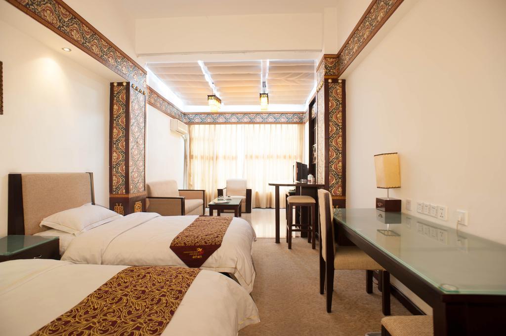 Jiuzhaigou Jinzhulinka Resort Hotel Habitación foto