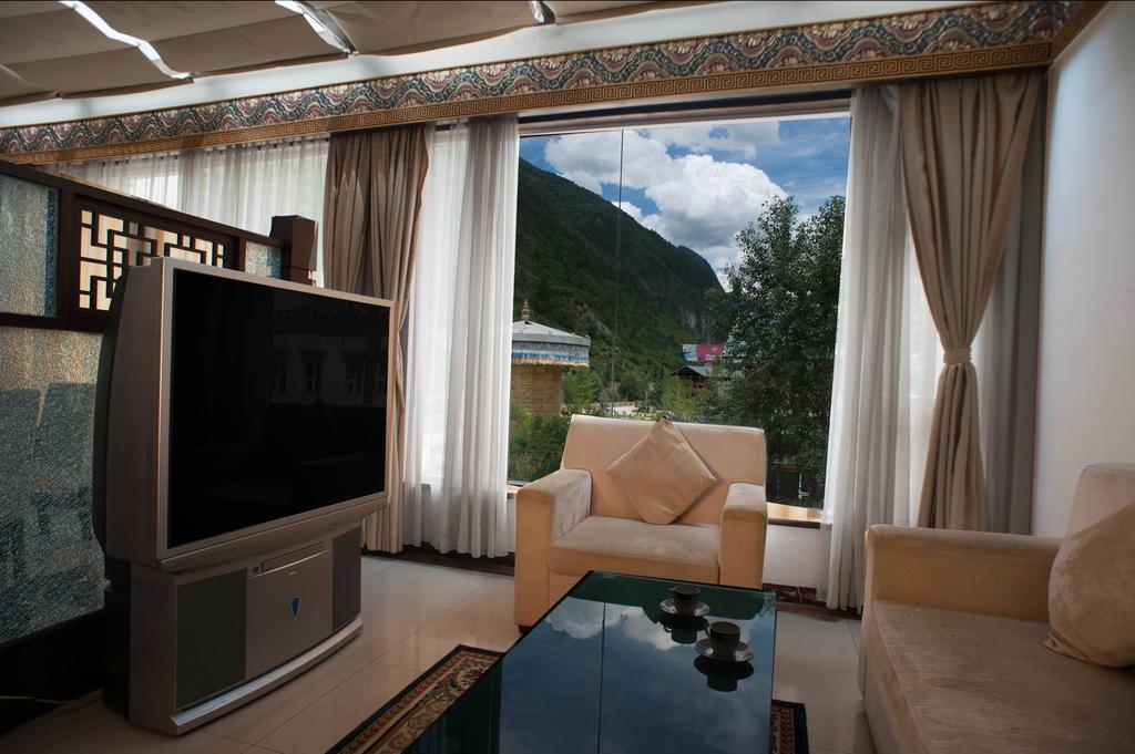 Jiuzhaigou Jinzhulinka Resort Hotel Habitación foto