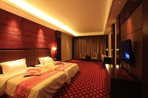 Jiuzhaigou Jinzhulinka Resort Hotel Habitación foto