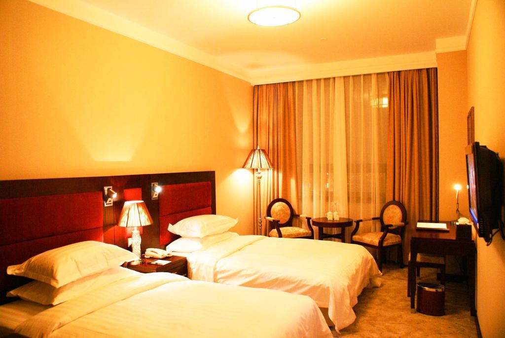 Jiuzhaigou Jinzhulinka Resort Hotel Habitación foto