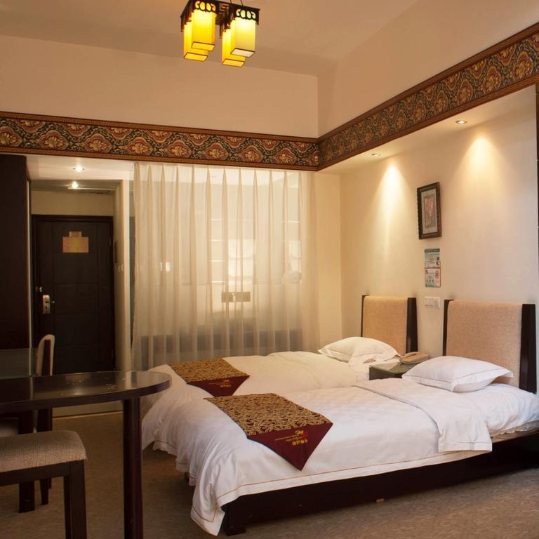 Jiuzhaigou Jinzhulinka Resort Hotel Habitación foto