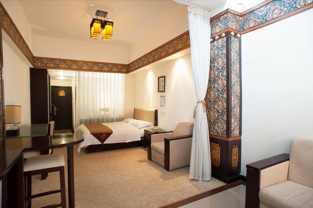 Jiuzhaigou Jinzhulinka Resort Hotel Habitación foto