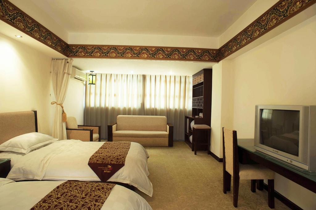 Jiuzhaigou Jinzhulinka Resort Hotel Habitación foto